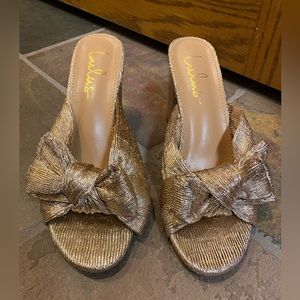 Lulu’s gold rafia bow heels
